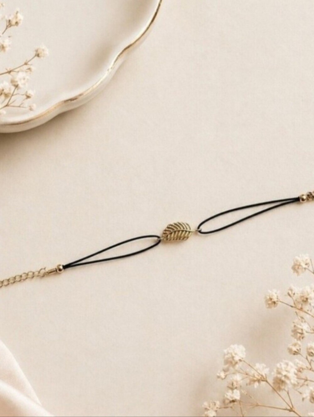 Delicate Black Cord Bracelet with Gold Leaf Accent